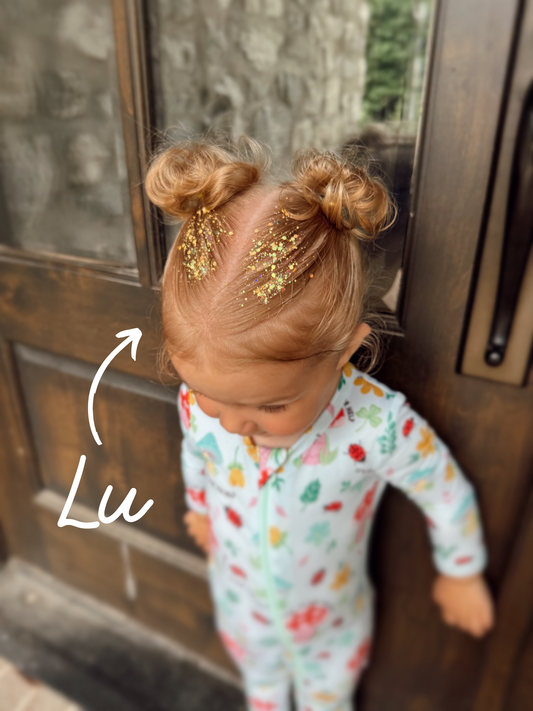 Lu Pixie Paste hair glitter in rainbow mix—safe, non-toxic, biodegradable sparkle gel for kids and adults.